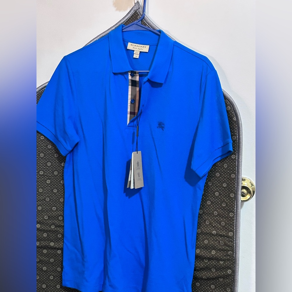 Burberry medium blue polo NEW
